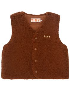 The Tiny Brown Quilted Vest is the perfect waistcoat for colder days, combining style and functionality. Made from soft, plush fleece in brown, the waistcoat has lightweight insulation, making it the perfect layering piece. The button fastening on the front and the TINY logo on the back add a unique touch, perfect for any occasion. Brown Sleeveless Vest For Cold Weather, I Logo, Short Blouses, Bloomers Shorts, Tiny Cottons, Boys Swim, Quilted Vest, Stylish Kids