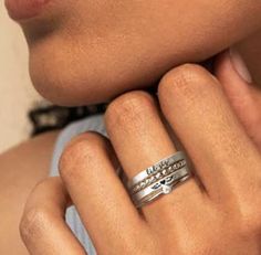 This elegant memorial ring set is the perfect gift to honor a loved one. Crafted of high-grade sterling silver and fine silver, the angel wing name ring is a timeless and beautiful memento. Capture a name or special date to memorialize a loved one forever. Ring set includes four total rings: one name ring, one angel wing ring, a beaded ring, and a clear cz ring. Choose between the listed fonts and three metal options: silver or 14K yellow gold filled. Gold-filled is a waterproof amazing alternat Forever Ring, Wing Ring, Angel Wing Ring, Remembrance Jewelry, Memorial Ring, Ring Spacer, Name Ring, Beaded Ring, Name Rings