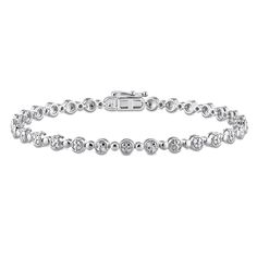 This pretty bracelet is crafted in lustrous sterling silver and features round, pave-set diamonds placed in circular motifs. Enhanced with a high polished finish, this diamond bracelet makes a valuable addition to any jewelry collection. Coordinate this bracelet with any casual or business attire and look stunning. The diamonds are 1/4ctw, H in color, and I3 in clarity. This bracelet measures 7.5 inches in length and 3.9mm in width. Sterling Silver Bracelet With Pave Diamond Setting, White Gold Diamond Bracelet With Pave Setting, Silver Tennis Bracelet With Pavé Setting, Classic Round Diamond Bracelet With Pave Setting, Silver Tennis Bracelet With Pave Setting, Silver Diamond Bracelet With Pave Setting, Formal Sterling Silver Bracelet With Pave Setting, Sterling Silver Bracelet With Pave Setting For Formal Occasions, Silver Bracelets With Pave Setting