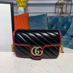 Description GG Marmont Diagonal Matelass Shoulder Bag Black Red For Women 10in/26cm GG 443497 Rep 1:1 Measurements: 26 x 15 x 7 cm / 10 x 6 x 3 inches ( Length x Width x Height ) The GG Marmont is reimagined through eye-catching new shades and textures. A recognizable member of the Beloved lines, the line is defined by its Double G hardware and matelassé. As a part of GG Love Parade, a new iteration of the line is introduced in black with two different quilted geometric motifs. The small shoulder bag is completed by silver-toned Double G hardware. Black Red matelassé Palladium-toned hardware Microfiber lining with a suede-like finish Double G Interior zipper pocket Sliding chain strap can be worn as a shoulder strap with 55cm drop or can be worn as a top handle with 30cm drop. Flap with sp Gucci Love Parade, Gucci Marmont Mini, Love Parade, Chanel Shirt, Gucci Marmont, Loafer Mules, Gg Marmont, Shoulder Bag Black, Large Shoulder Bags