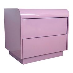 a close up of a purple dresser with two drawers on one side and an open drawer on the other