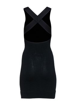 Show off those curves with this sexy bodycon dress from Jonathan Simkhai! This rib knit dress will graciously hug your body and accentuate your hourglass frame while also keeping you comfortable with the soft fabric. The low back detail will allow you to show off your back in a tasteful way, which will make this the perfect piece to slip into for a hot date night! Pair this with your favorite pair of stilettos and watch your special someone swoon over how amazing you look! Size XS Fabric content Ribbed Stretch Bodycon Dress, Stretch Ribbed Bodycon Dress, Stretch Ribbed Elastane Bodycon Dress, Black Ribbed Elastane Dress, Black Ribbed Dress In Elastane, Ribbed Bodycon Elastane Mini Dress, Ribbed Stretch Mini Dress For Evening, Stretch Ribbed Mini Dress For Evening, Black Fitted Ribbed Mini Dress