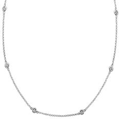 This lovely 14 karat white gold cable chain includes 11 round diamond stations  at approximately .28 carat total weight  that give the chain a dazzling look. The chain length is 18 inches and can be worn at 16 inches for the perfect fit. Jewelry Cleaning Solution, Sparkle Necklace, Platinum Jewelry, Elegant Pendant, Bezel Set Diamond, Station Necklace, Sapphire Jewelry, Cleaning Jewelry, Bezel Setting