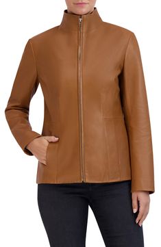 A soft lambskin leather jacket features a wing collar for contemporary style. 22" length Wing collar Long sleeves Front zip closure Front on-seam pockets Lambskin leather construction Lined Shell: 100% leather/lining: 100% polyester Professional leather clean Imported Model stats: 5'10" height, 32" bust, 25" waist, 36" hip. Model is wearing size S. Elegant Leather Jacket With Zip Fly, Sleek Brown Leather Outerwear, Sleek Brown Leather Jacket For Fall, Classic Leather Jacket With Padded Collar For Spring, Solid Leather Jacket With Zipper Closure, Collar Leather Jacket, Wing Collar, A Wing, Lambskin Leather Jacket