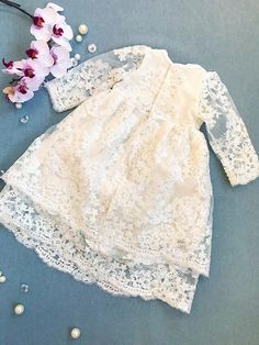 Hemera two-layered lace dress christening gown ivory | Etsy Delicate Cream Dress With Lace Details, Delicate Cream Dress With Delicate Lace, Delicate Cream Dress With Lace, Delicate White Dress With Lace Sleeves, Delicate Cream Lace Dress, Cream Baptism Dress With Lace Bodice, Delicate White Dress With Lace Bodice, First Communion Lace Dress With Lace Patchwork, Lace Patchwork Dress For Baptism