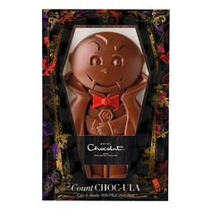 an image of a chocolate man with a red bow tie in a card board box