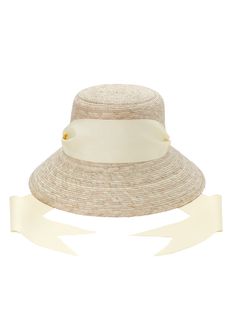 Editor turned designer Sarah Bray’s charming hat collection has taken Instagram’s influencer world by storm. Each hat is made from vintage, recycled, and biodegradable materials and accented with an antique ribbon. Any additional stitching is done by local artisans within her home state of Texas and new island home of Bermuda. A perfectly elegant addition to any warm weather ensemble, the Clematis Bucket Hat is adorned with Ivory Grosgrain Ribbon. Brass grommets sit atop each side, allowing you Short Brim Sun Hat With Ribbon For Garden Party, Ribbon Hat For Kentucky Derby Garden Party, Kentucky Derby Garden Party Hat With Ribbon, Adjustable Curved Brim Hat With Ribbon, Adjustable Ribbon Hat For Kentucky Derby, Cream Flat Brim Straw Hat For Garden Party, Adjustable Hat With Ribbon For Kentucky Derby, Garden Party Hat With Ribbon And Wide Brim, Kentucky Derby Straw Hat With Ribbon