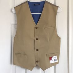 Izod Kaki Button Up Lined Vest Youth/Jrs Sz 18-20 Xl New With Tags. Check Measurements For Fit. *****Bundle Two Or More Items And Save 15% And Pay Shipping For One Item. ( Items Will Ship Together.)***** Measures Approximately: 18” Underarm Seam To Underarm Seam 36” Bust With A Bit Of Stretch With Cotton Spandex Outer And Adjustable Back Strap 22” Top Back Collar Seam To Lower Front At Lowest Cotton Button-up Vest With Buttons, Fitted Cotton Button-up Vest, Cotton Button-up Vest, Brown Cotton Vest With Buttons, Sleeveless Cotton Outerwear With Button Closure, Brown Cotton Vest With Button Closure, Casual Beige Vest With Button Closure, Fitted Casual Vest With Buttons, Beige Cotton Vest With Button Closure