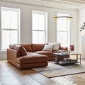 a living room filled with lots of furniture next to two large windows on top of a hard wood floor