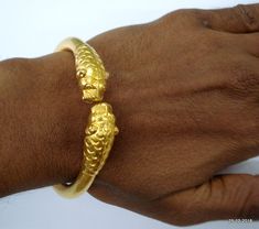 "Ethnic Traditional design gold vermeil gold gilded silver Bracelet or Bangle from Rajasthan India. This Bangle has been made in Rajasthan by Expert local silversmith, it is handmade and has very nice traditional look. Very Easy to wear by little twiest. weight - 24 grams Inner Diameter - 5.9 cm (2.3\") Inner circumference - 18.5 cm (7.28\") Outer diameter - 7.3 cm (2.87\") width - 0.8 cm material - Good silver with gold plate." Unique Gold Cuff Bracelet With Intricate Design, Unique Yellow Gold Bracelets For Ceremonial Occasions, Unique Yellow Gold Bangle Bracelet, Unique Brass Bangle In Yellow Gold, Gold Cuff Bracelet As Festival Gift, Gold Cuff Bracelet For Festivals Gift, Gold Cuff Bracelet For Festivals And Gifts, Unique Yellow Gold Brass Bangle, Unique Yellow Gold Bangle For Wedding