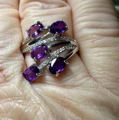 Gemstone: genuine natural oval cut amethyst Size: 6mm x 4mm x 2mm Weight: 1.25cttw approx. Accent stones: round cut white topaz Metal: .925 stamped Sterling Silver, rhodium plated & 18kt gold played Size: adjustable 8 1/2 to 10 Weight: 3.8g Oval Amethyst Ring With Cubic Zirconia And Gemstone Accents, Oval Amethyst Ring With Cubic Zirconia Accents, Formal Purple Amethyst Ring With Stones, Oval Amethyst Cubic Zirconia Ring, Oval Amethyst Ring With Cubic Zirconia, Oval Purple Amethyst Ring With Cubic Zirconia, Oval Multi-stone Amethyst Gemstones, Oval Purple Diamond Gemstones, Oval Amethyst Gemstones With Gemstone Accents