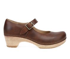 Take the classic Mary Jane style to new heights with Lilah. It's a heeled clog on a timeless favorite that you'll adore. Oiled Pull Up Leather upper, Adjustable Mary Jane buckle strap for secure fit,2\ faux wood platform demi wedge heel, Round toe, Polyurethane lined footbed, Rubber outsole, SIZE CONVERSION: US - EURO, US 6 - EURO 36,US 7 - EURO 37,US 8 - EURO 38,US 9 - EURO 39,US 10 - EURO 40,US 11 - EURO 41,US 12 - EURO 42 | Women's Dansko Lilah Mary Jane Clogs in Tan Size 10 Dansko Maryjane Clog Outfits, Brown Slip-on Clogs With Leather Sole, Brown Suede-lined Clogs With Round Toe, Brown Slip-on Clogs With Removable Insole, Brown Leather Clogs With 4-inch Heel, Womens Clogs And Mules, Mary Jane Clogs, Clogs And Mules, Womens Clogs