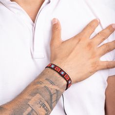 This Kemanipa Bracelet is the perfect way to make a statement! Crafted to perfection with blue, red, burgandy, and black loom-woven beads, this unisex bracelet is sure to stand out! And in the Embera language, Kemanipa means "square", so you know it's uniquely stylish! Black Woven Bracelets For Festival, Red Woven Beaded Bracelets As Gift, Black Woven Beaded Bracelets For Festival, Red Woven Friendship Jewelry, Red Woven Jewelry For Friendship, Casual Red Beaded Bracelets With Black Beads, Red Woven Bracelets For Friendship, Red Woven Beaded Bracelets For Festivals, Red Beaded Bracelets With Black Beads For Festival