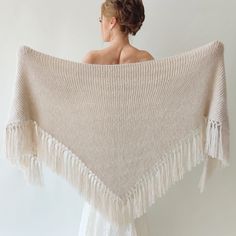 Wrap yourself in elegance with the handcrafted triangular light beige shawl, perfect for your winter wedding or evening gatherings. Its versatile silvercover up design complements any attire while keeping you cozy and shielding you from the cold during the fall, winter, and spring months. Moreover, these beige wrap make an excellent bridesmaid gift. MATERİAL:  Very soft, fuzzy and warm yarn. it is not itchy at all. 10% mohair, 10% wool, 80% premium acrylic-Polyamid MEASUREMENTS (Average): Length Winter Wedding Dress Coverups Knitted, Wedding Shawls And Wraps Vobelle, Wedding Shawls And Wraps Western, Winter Bridal Party Shawl, Wedding Shawls And Wraps Lightinthebox, Winter Bride Blanket, Bridesmaid Shawls Fall, Winter Elopement Blanket, Winter Shawl Bridesmaid