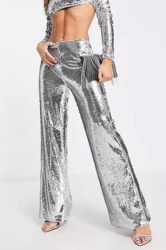 Features of Silver Sequin Set 💖1. Glittering Sequins The silver sequin set, adorned with high-quality and dazzling sequins, sparkles brilliantly in the light. Its shiny effect ensures you stand out from the crowd, adding a touch of glamour to your presence.💖2. Comfortable Fit Victray's silver sequin suit is not only charming but also crafted from soft and elastic materials, guaranteeing both style and comfort. With this suit, you can move freely and confidently, enjoying the event without any Silver Trousers, Sequin Trousers, Sequin Set, Turtleneck Crop Top, Sequin Suit, Relaxed Pants, Relax Pants, Sequin Pants, Silver Sequin