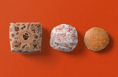 three different types of donuts on an orange background