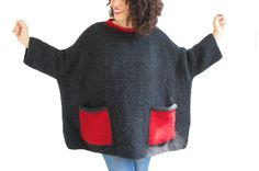 This sweater is hand knitted with high quality, thin and anti allergic wool & angora blended yarn. It has 2 pockets. Photos show dark gray / anthracite main color and red color pockets. I can knit in different colors. If you prefer different colors please contact with me. It is light weight, warm and cozy. Plus size, over size. Long sleeves. Any question, just convo. -----------------Made in a pet-free and smoke-free environment.----------------- -----------------All hand crocheted and hand Knitting Kids Sweaters, Hand Knit Poncho, Hand Knitted Jumpers, Woman Sweater, Hand Knit Sweater, Plus Size Sweater, Plus Size Pullover, Loose Fit Sweater, Oversize Pullover