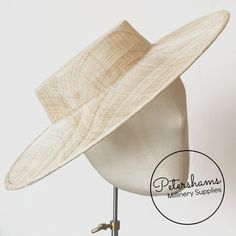 Boaters are all the rage, and this natural sinamay fascinator version has us all in a twirl! Made from 2 layers of stiffened sinamay, these boaters are ready to trim and have a petersham ribbon on it's inside edge. Simply add a comb or headband to secure to the head.Hat base measures:Width: 37cm (14.5 inches)Crown Width: Measures 15.5cm (6.1 inches) wide at base and 14cm (5.5 inches) at top Crown Height: 4.5cm (1.7 inches)Please note our latest batch of boaters have been made slightly bigger thi Adjustable High Crown Straw Hat In Natural Color, Adjustable Short Brim Hat For Kentucky Derby, Adjustable High Crown Straw Hat For Spring, Fitted Hat With Round Crown For Kentucky Derby, Classic High Crown Boater Hat For Summer, Classic Adjustable Costume Hats For Kentucky Derby, Adjustable Round Crown Mini Hats For Kentucky Derby, Fitted High Crown Straw Hat For Summer, Fitted High Crown Boater Hat For Beach