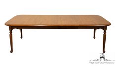 a wooden table sitting on top of a white background