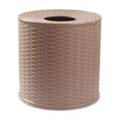 a brown wicker waste basket on a white background