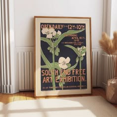 an old poster advertises the opening of south end art exhibition, in front of a radiator