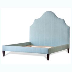 an upholstered bed frame with wooden legs and headboard in light blue fabric