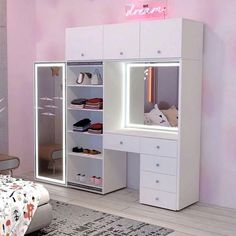 a bedroom with a bed, dresser and shoe rack in the corner next to a pink wall