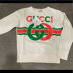 Brand New With Tag Cream With Red And Green Gg Print Long Sleeve Unisex In My Opinion! Ig: Luxurylady_bird #Gucci #Guccisweater #Guccikids #Guccitop Gucci Sweater, Gucci Shirts, Gucci Top, Gucci Kids, My Opinions, Shirt Color, Kids Shirts, Sweat Shirt, Shirts Tops