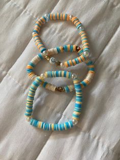 Blue, orange, and white preppy set! Preppy Clay Bead Bracelets, Bracelets Preppy, Clay Bead Bracelets, Preppy Bracelets, Clay Bead, Bracelet Ideas, Bead Bracelets, Pearl Shell, Clay Beads