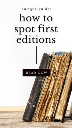 an old book sitting on top of a wooden table