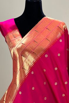 This exquisite regal paithani saree is handwoven in rani pink shot with vermillion red. Gold silver zari dollar buttis adorn the body while the gold zari border is decorated with handwoven triple line of parrots that we call triple muniya border. The elaborate pallu is woven with colorful Peacocks along with winding vines. The saree comes with plain blouse with matching borders. Approximate Length 6.5 mtrs (inclusive of blouse length)Height - 48- 52" Saree comes with fall, picot and tassels done. Blouse piece is cut. Approximate weight - 1.8 lbs Kindly Note : The colors you see on your device may vary due to the color reproduction, brightness and resolution of individual devices. If you'd like more clarity before your purchase, please contact our support team. *** Readymade blouse is not p Triple Muniya Border Paithani, Muniya Border Paithani Saree, Pink Paithani Saree, Pink Paithani, Baby Pink Saree, Saree Inspiration, Pink Shot, Fall Eye Makeup, Paithani Silk Saree