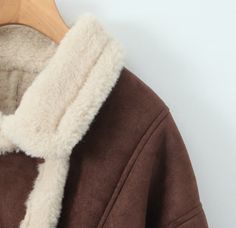 About: Stay toasty with this comfy shearling coat! It wraps you in unmatched warmth and timeless style. Elevate your winter wardrobe with this versatile, cozy essential. Specs: Side pockets Material: Polyester, faux shearling Brown Sherpa Outerwear With Faux Fur Lining, Brown Fur Coat With Fleece Lining For Winter, Brown Sherpa Outerwear For Winter, Brown Fur Coat With Fleece Lining For Cold Weather, Brown Outerwear With Plush Lining For Cold Weather, Brown Plush Lined Outerwear For Cold Weather, Brown Plush-lined Outerwear For Cold Weather, Brown Cozy Fur Coat With Faux Fur Lining, Cozy Brown Fur Coat With Faux Fur Lining