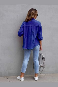 This Distressed Drop Shoulder Denim Jacket is expertly crafted for a stylish and comfortable fit. Made with high-quality denim, this jacket boasts durability and a timeless look. The drop shoulder design adds a modern twist to a classic style. Perfect for any casual or dressy occasion, this jacket is a must-have for any fashion-forward individual. Features: Fringe Stretch: No stretch Material composition: 65% cotton, 35% polyester Care instructions: Machine wash cold. Tumble dry low. Imported Pr Dark Wash Cotton Shacket For Fall, Ripped Relaxed Fit Cotton Outerwear, Ripped Cotton Outerwear With Relaxed Fit, Distressed Denim Jacket With Relaxed Fit, Distressed Denim Jacket With Relaxed Fit And Long Sleeve, Distressed Long Sleeve Denim Jacket In Relaxed Fit, Casual Ripped Washed Blue Denim Jacket, Casual Washed Blue Ripped Denim Jacket, Ripped Long Sleeve Cotton Outerwear