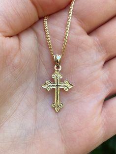 Beautiful 14k yellow gold  cross pendant.  Material: 14k solid yellow gold. Length: Approximately 1 inch long. Width: Approximately .25" wide. Weight: Approximately 1.3 grams.  Comes in a nice box. *Chain is sold separately. Chain typically weighs 5-7 grams depending on length chosen. It is a 14k gold Miami Cuban 2mm. Yellow Gold Polished Cross Necklace Pendant, 14k Yellow Gold Crucifix Jewelry, 14k Yellow Gold Cross Pendant Jewelry, Gold Crucifix Jewelry Stamped 14k, 14k Gold Crucifix Jewelry, 14k Gold Crucifix Hallmarked Jewelry, 14k Gold Hallmarked Crucifix Jewelry, 14k Gold Cross Jewelry With Polished Finish, 14k Yellow Gold Cross Jewelry