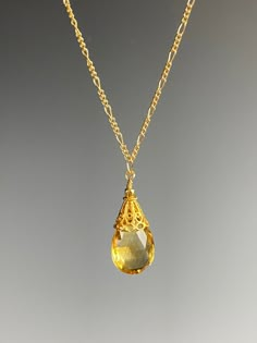 "Oh my, what a lovely and elegant Citrine gemstone! This faceted, clear, warm golden yellow Citrine pendant is a star on its own. It looks like a lovely drop of honey! A Vermeil gold cap tops the Citrine as it hangs from a Gold Fill chain. A perfect adornment with any outfit and adjustable to suit any neckline. Perfect as a gift for any occasion and the birthstone for November. Arrives in a standard gift box. FOR GIFT GIVING: ** Satin gift pouch with note card and upgraded jewelry box is also av Topaz Jewelry Yellow, Citrine Necklace Pendants, Eccentric Jewelry, Box For Gift, Chinese Clothes, Easter Jewelry, Raw Gemstone Jewelry, Gold Cap, Citrine Jewelry