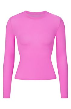 This crewneck T-shirt that perfectly hugs your curves with a buttery-soft feel is perfect to wear alone or layer under closet essentials. It's part of Kim Kardashian's sought-after SKIMS line. 20 1/2" length (size Medium) Crewneck Long sleeves 76% polyamide, 24% elastane Machine wash, tumble dry Imported Orchid Color, Cut Shirts, Kim Kardashian, Cool Shirts, Long Sleeve T Shirt, Hot Pink, Colorful Shirts, Long Sleeve Tshirt, Long Sleeve Tops