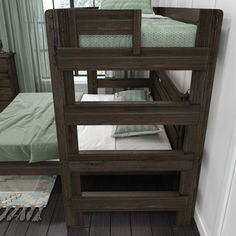 a wooden bunk bed sitting next to a window