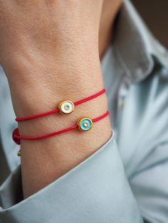 In many tradittion red string bracelets are worn as a symbol of good fortune, prosperity and good fortune. Also Protect its wearer from harmful energy and gives healthy, happiness and good luck Red Bracelet, Greek traditional bracelet, Summer bracelet,Red Evil eye bracelet, spring bracelet, lucky charm, summer bracelet ---Material: Mini evil eye 0,8cm Gold plated 24 k over brass Brass and hight quality enamel ---Size is adjustable for fits all wrist size from 14cm -20 cm For other size please le Red Evil Eye Bracelet For Good Luck, Red Evil Eye Bracelet Gift, Gold Evil Eye Bracelet With Sliding Knot As Gift, Handmade Yellow Gold Evil Eye Bracelet Gift, Red Evil Eye Jewelry, Red Evil Eye Bracelet, Traditional Bracelet, Gold Evil Eye Bracelet, Red Evil Eye