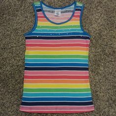 New Without Tags, Girls Rainbow Stripe Tank Top In Size Medium Plus. It Is By: Canyon River Blues. Made Of 100% Cotton. It Is Accented With Gemstones Across The Top Front. The Measurement From Armpit To Armpit Is 14" & From The Top Of The Shoulder To The Bottom It Is 22". Very Cute & Great For Spring/Summer. Comes From A Smoke Free Home. Playful Striped Tops For Playwear, Striped Tops For Playwear In Spring, Striped Tops For Spring Playwear, Fun Blue Tops For School, Cute Rainbow Tops For Spring, Cute Rainbow Summer Tops, Summer School Stretch Top, Cute Sleeveless School Tops, Stretch Summer Top For School