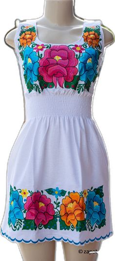 Traditional White Sleeveless Dress, Traditional White Sleeveless Embroidered Dress, White Fitted Mini Dress For Festival, White Intricate Embroidery Vacation Dress, White Bohemian Cotton Dress, White Dresses With Intricate Embroidery For Vacation, White Dress With Intricate Embroidery For Vacation, White Embroidered Sundress For The Beach, Fitted White Embroidered Dress With Embroidered Hem