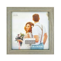 a photo frame with a man and woman holding flowers