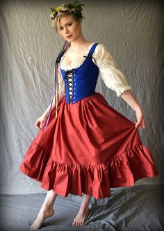 "Hike up your skirts and get ready to meander your local Festival! The perfect accompaniment to your Festival wear, this versatile Renaissance Faire skirt looks great in a rainbow of colors- you choose from the many colors of Kona Cotton (let me know your selection at checkout, see link below for color swatches). The Renaissance Faire Skirt is a versatile full petticoat with an adjustable drawstring waistband making it a less bulky option for wearing underneath your bodice. Comfortable and breat Ren Faire Outfits, Corset And Skirt, Ren Faire Costume, Short Pollera, Fair Outfits, Fest Outfits, Festival Skirts, Corset Bodice, Mode Chic