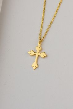 Celebrate your faith in style with our solid gold cross necklace. Expertly crafted in 14k gold, its minimalist design radiates timeless elegance, seamlessly fitting any outfit or occasion. A meaningful accessory that speaks volumes. #GoldCross #SpiritualJewelry Gold Minimalist Personalized Cross Necklace, Gold Personalized Minimalist Cross Necklace, Minimalist Personalized Gold Cross Necklace, Dainty Gold Sterling Silver Cross Necklace, Minimalist Gold Cross Necklace As Gift, Dainty Gold-plated Cross Necklace Gift, Dainty Gold Plated Cross Necklace As Gift, Necklace With Cross, Silver Necklace For Women