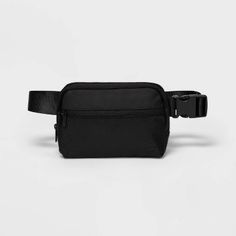 Why we're ALL IN:

Fanny pack is perfect for carrying small essentials while working out or on the go. The main body is made from water-repellant 100% recycled polyester fabric, and it boasts a top zipper closure with inner phone pouch plus a smaller outside zippered pocket to keep small items like keys and snack bars secure and close at hand. Use the adjustable buckle waist strap to find the perfect fit.

All in Motion™: Made for every move, priced for every day. Sporty Everyday Belt Bag, Black Sporty Travel Accessories For Outdoor, Black Sporty Outdoor Travel Accessories, Functional Sports Belt Bag With Cell Phone Pocket, Functional Belt Bag With Cell Phone Pocket For Sports, Sporty Belt Bag With Zipper For Sports, Sporty Nylon Travel Accessories With Functional Pockets, Black Nylon Belt Bag For Sports, Sporty Nylon Belt Bag For Everyday