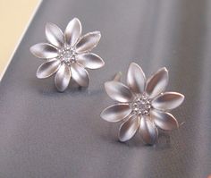 Pretty Daisy Earrings Silver Flower Detail Earrings For Gift, Silver Earrings With Flower Decoration For Gift, Matching Flower Earrings For Bridesmaids Gift, Flower Shaped Earrings For Bridesmaid Gift, Flower-shaped Earrings For Bridesmaid Gift, Jewelry Everyday, Jewelry Wishlist, Daisy Studs, Gift Post