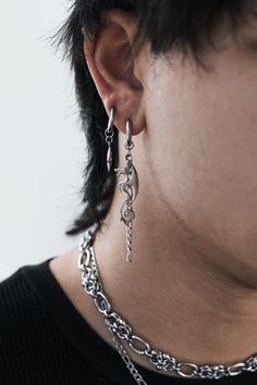 Dragons, chains and spikes - simply badass.    ★ Hand-crafted to order. ★ Available in silver stainless steel only. ★ Available as a singular earring or pair. ★ Full Stainless Steel. High quality long-lasting jewelry.. ★ 2 earring types available:  10mm Hoops, and 10mm Clip On Hoops. Fully Stainless Steel. Dangly Earrings Men Clay, Minimalist Metal Jewelry For Streetwear, Gothic Silver Metal Piercings, Edgy Silver Dangle Jewelry, Punk Style Dangle Chain Jewelry, Edgy Silver Surgical Steel Jewelry, Edgy Silver Jewelry In Surgical Steel, Edgy Silver Jewelry Made Of Surgical Steel, Sterling Silver Punk Style Chain Jewelry