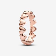 Give a gift from the heart with this 14k rose gold-plated ring. Expertly crafted with a row of hearts making up the band, this romantic design looks equally beautiful worn on its own or layered with contrasting Pandora rings. Give it as a gift for a meaningful way to express your love, or treat yourself to a piece you'll love wearing over and over. - Pandora Row of Hearts Ring - 14k Rose gold-plated unique metal blend - Sz. 7 Rose Gold Promise Jewelry For Valentine's Day, Rose Gold Stackable Heart Ring For Valentine's Day, Stackable Rose Gold Heart Ring For Valentine's Day, Stackable Rose Gold Heart Promise Ring, Elegant Rose Gold Heart Ring For Mother's Day, Anniversary Rose Gold Stackable Heart Ring, Valentine's Day Adjustable Rose Gold Stackable Rings, Adjustable Stackable Rose Gold Heart Ring, Valentine's Day Rose Gold Stackable Rings