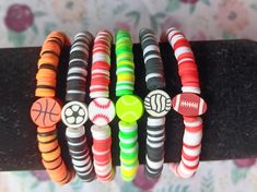 several bracelets with different designs on them