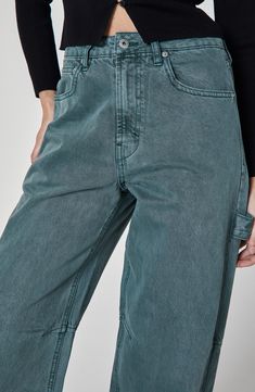 Carpenter pockets and a hammer loop lend bold workwear edge to these cargo-style jeans boasting a unique hue and relaxed, high-waisted silhouette. 29" inseam; 18" leg opening; 12 1/2" front rise; 15 1/2" back rise Zip fly with button closure Five-pocket style; hammer loop; back utility patch pockets 100% cotton Machine wash, line dry Imported Green Denim Cargo-style Bottoms, Green Denim Cargo Bottoms, Green Denim Cargo Style Bottoms, Green Denim Cargo Jeans With Pockets, Urban Cargo Pants With Five Pockets For Fall, High Rise Green Denim Cargo Jeans, Green Utility Jeans With Multiple Pockets, Denim Blue Cargo Pants For Fall, High Rise Cargo Pants With Patch Pockets For Fall