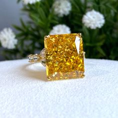 Vintage 15K 610 Solid Gold Yellow Sapphire, White Topaz Ring ...Marked 610 means 61% of Gold...Total of weights 6.9grams...Size 7...Measure of stone center 14 x 12MM ( 12.14ctw ) ....It's in very good condition. Luxury Yellow Diamond Ring Hallmarked, Luxury Yellow Diamond Hallmarked Ring, Luxury Cushion Cut Citrine Jewelry, Luxury Citrine Cushion Cut Jewelry, Luxury Yellow Topaz Ring With Diamond Accents, Luxury Yellow Gold Topaz Ring With Vvs Clarity, Luxury Yellow Topaz Ring With Diamonds, Yellow Rings With Diamond Accents In Fine Jewelry Style, Gold Cushion Cut Topaz Ring For Formal Occasions